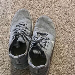 Nike Gray Low-Top Sneakers with Black Accents